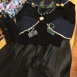 Not selling this knit sweater and leather skirt